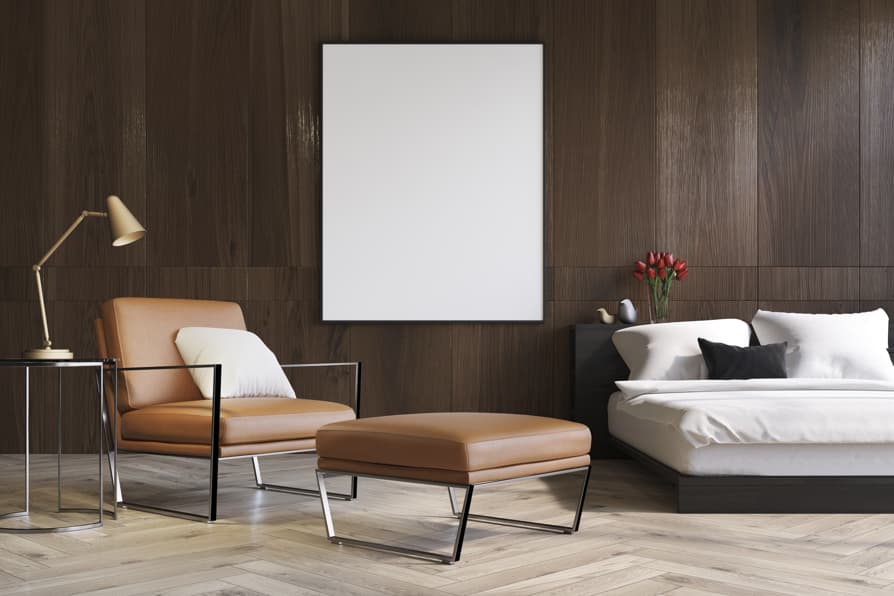 Upholstered accent chair with round side table for guest room seating