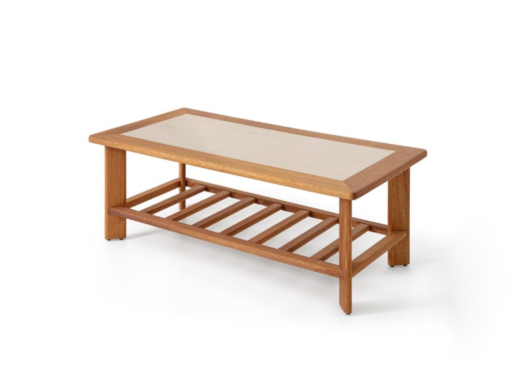 Hotel coffee table with solid wood frame, light tabletop surface, and lower storage shelf.
