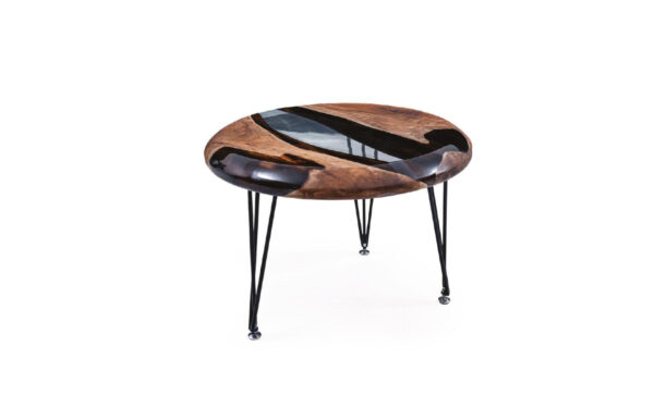 Round wooden coffee table with resin detail and metal hairpin legs for modern hotel lounge area