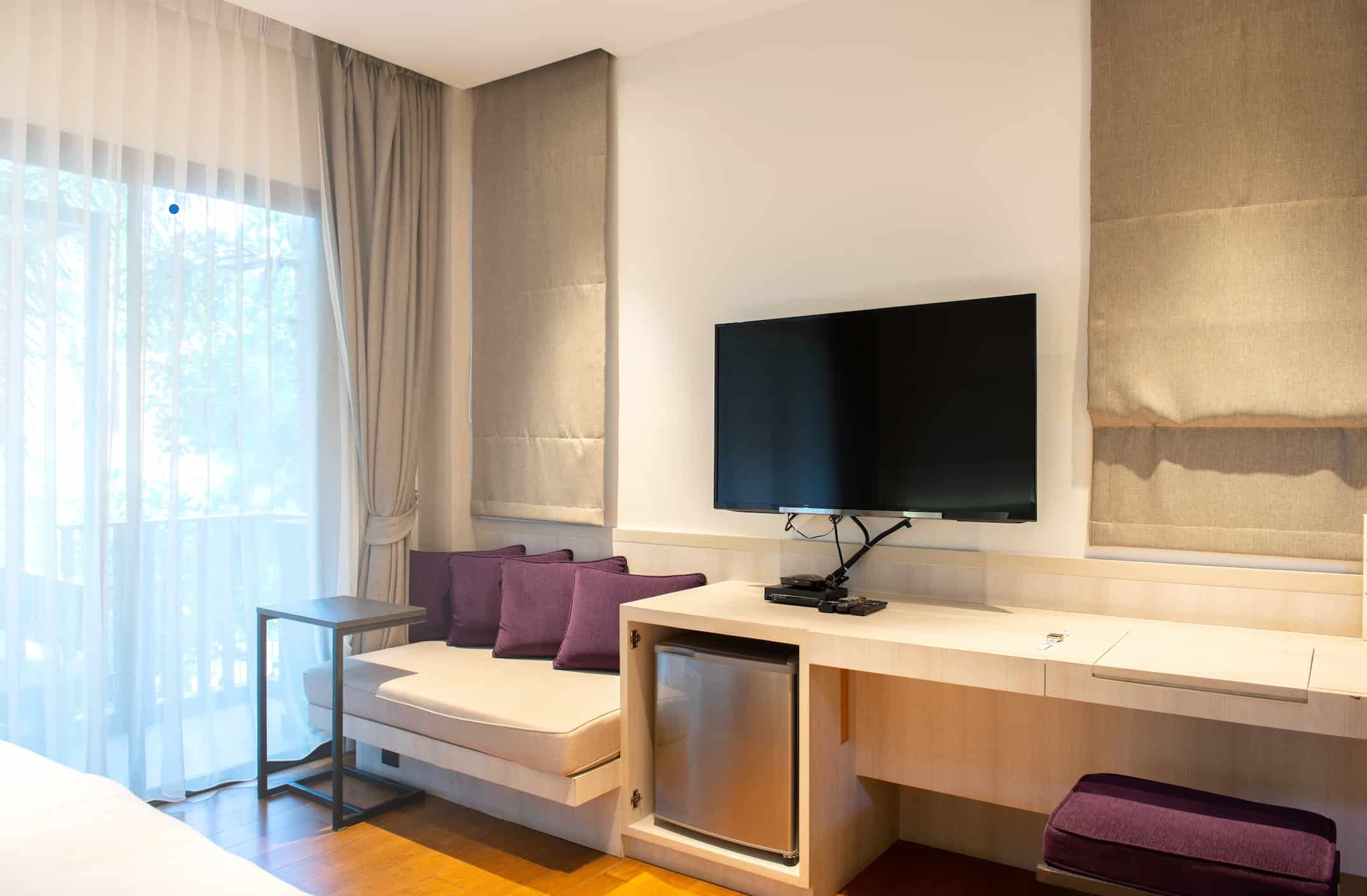 Hotel TV unit manufacturer in Turkey producing custom TV consoles with minibar for hotel rooms.
