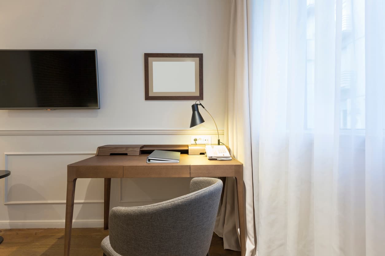 Hotel desk manufacturer in Turkey producing custom wooden writing desks for hotel guest rooms.