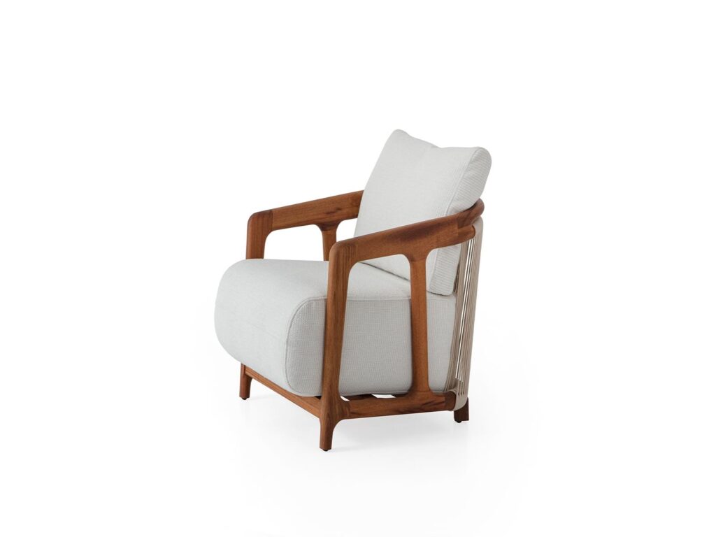 Modern lounge chair with light fabric upholstery and solid wood frame, designed for hotel lobby seating.